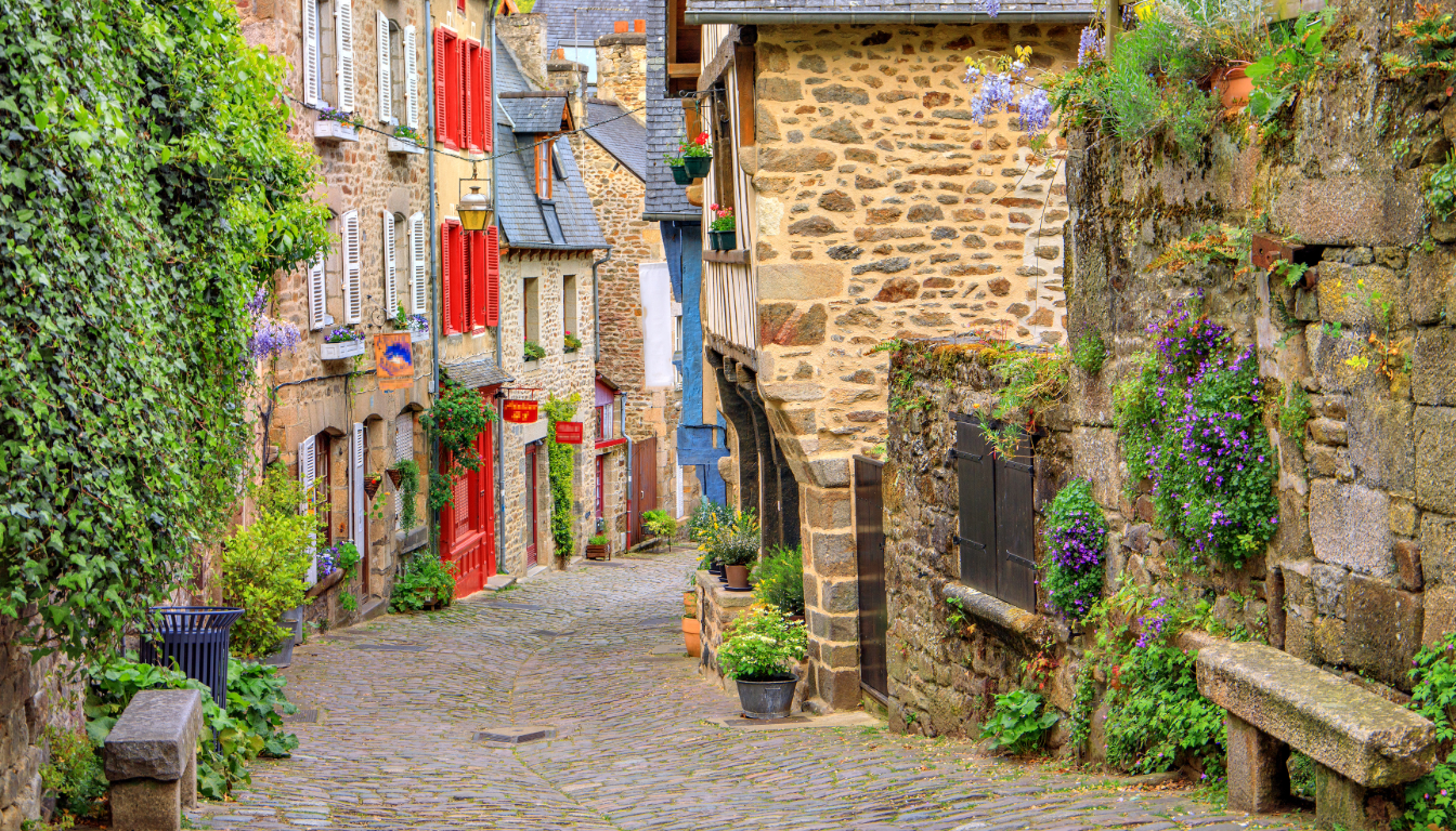 A typical street in the middle ages flanked with small shops.